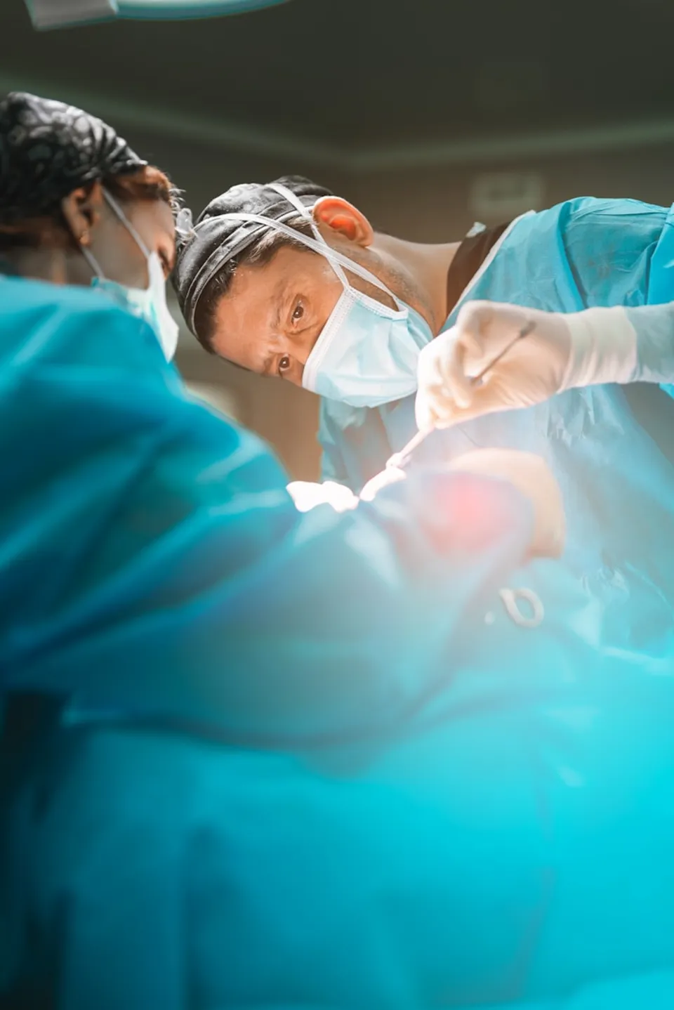 Surgeons performing a medical procedure